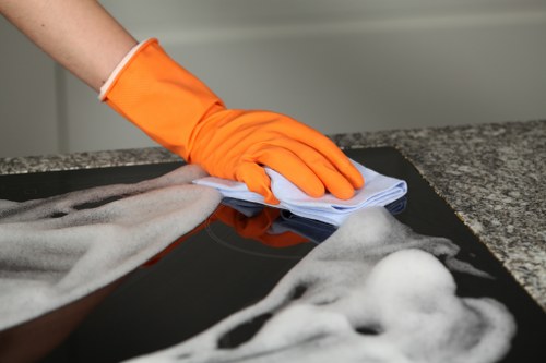 Carpet cleaning team preparing equipment with safety focus
